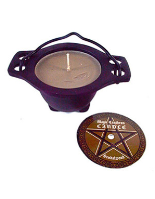 Sandalwood candle in cauldron